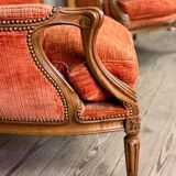 Pair of transitional carved wooden armchairs, 18th century