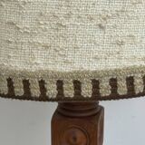 Brutalist floor lamp in turned wood, in the style of Charles Dudouyt.