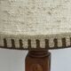 Brutalist floor lamp in turned wood, in the style of Charles Dudouyt.
