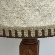 Brutalist floor lamp in turned wood, in the style of Charles Dudouyt.