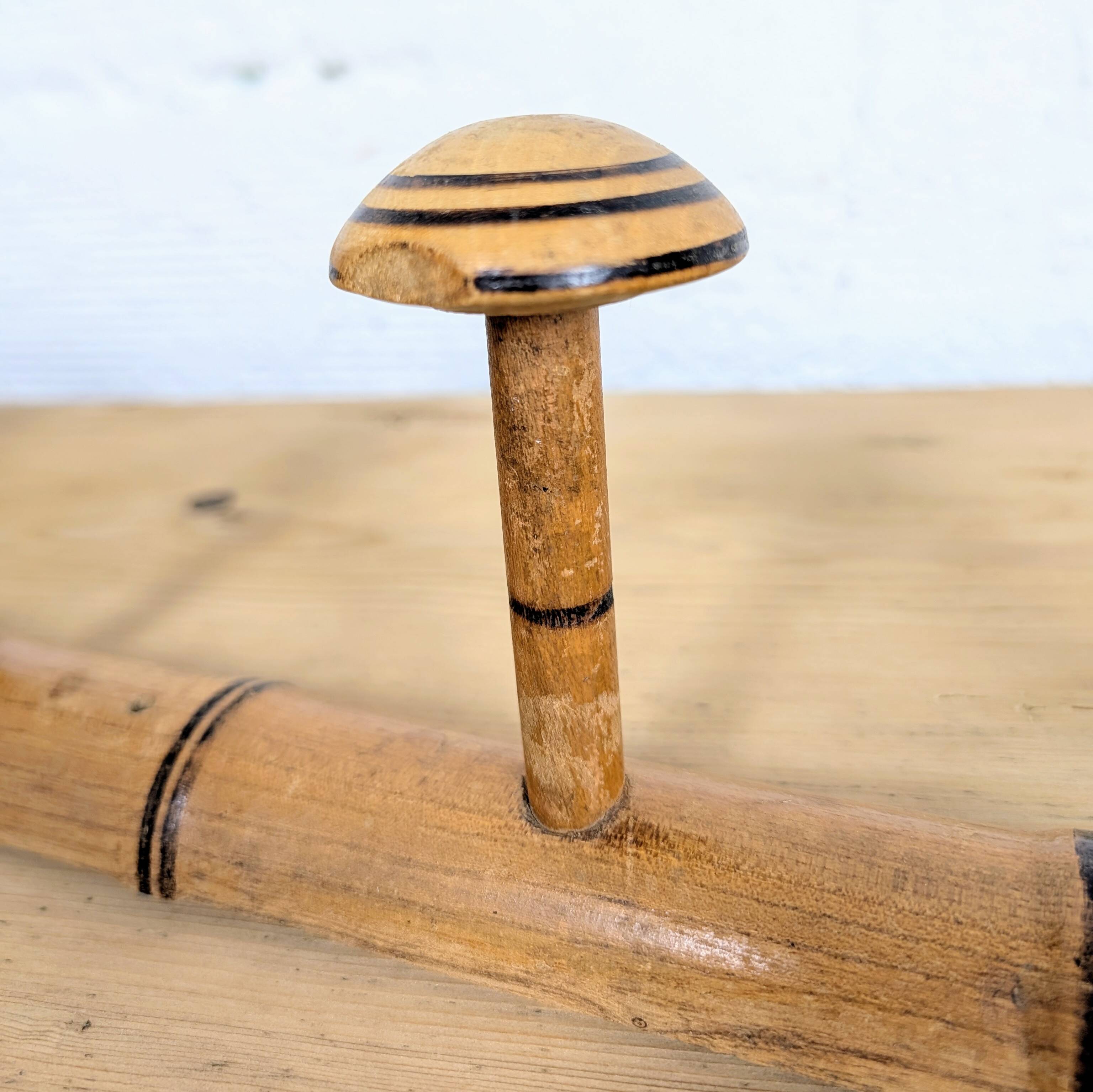 Turned wooden coat rack