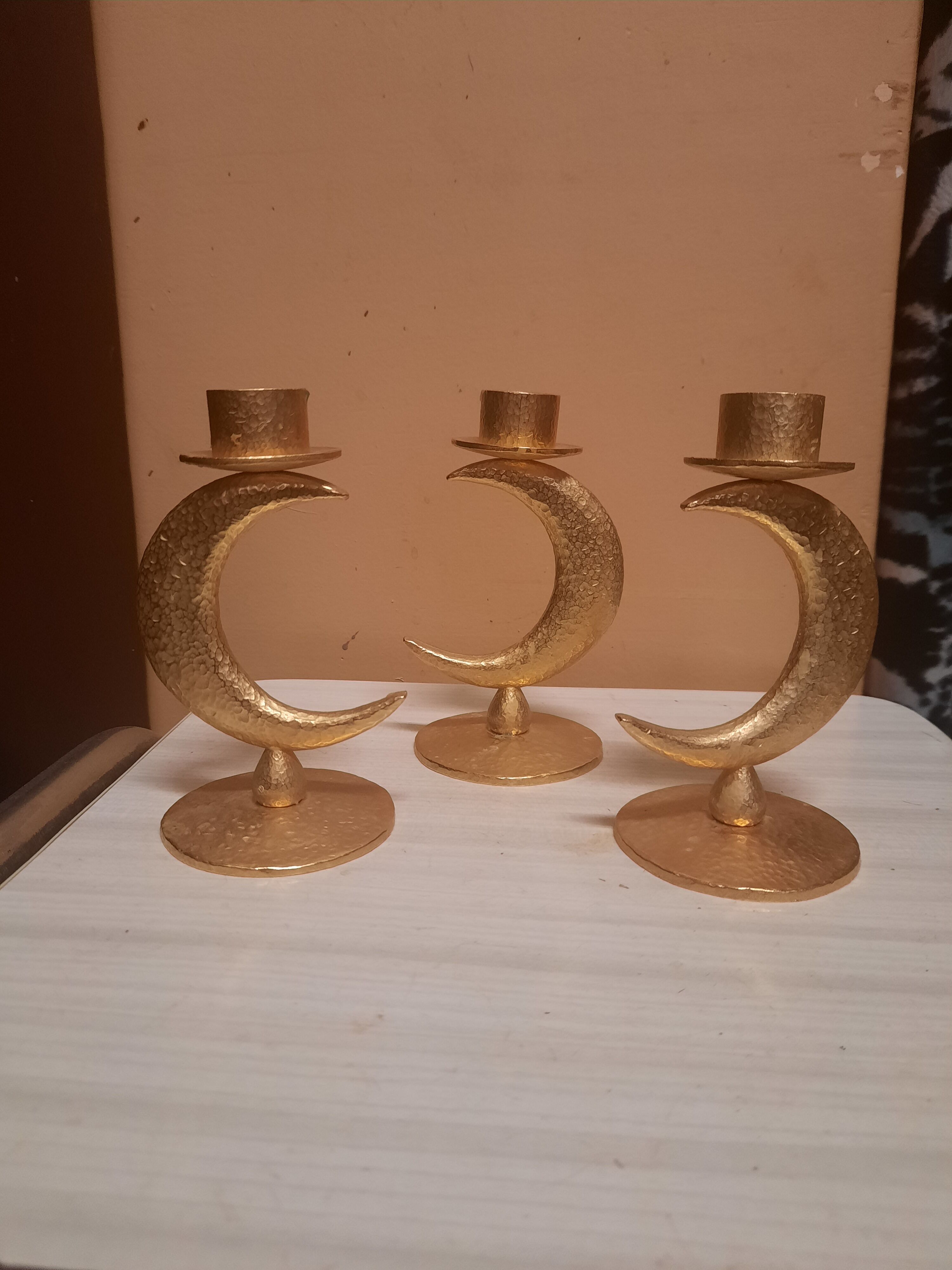 Set of 3 golden candlesticks created by Édouard Rambaud