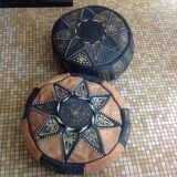 2 leather poufs