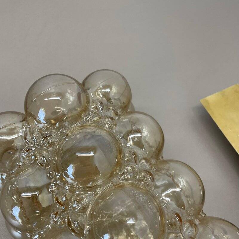 Amber vintage glass wall lamp by Helena Tynell for Glashütte Limburg, 1970s