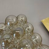 Amber vintage glass wall lamp by Helena Tynell for Glashütte Limburg, 1970s