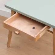 Small vintage children's desk attributed to Baumann – natural wood and lizard green top.