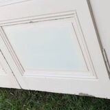 Pair of cupboard doors and old woodwork frame