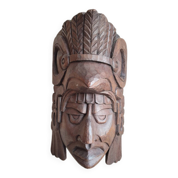 Masque mural en bois sculpté