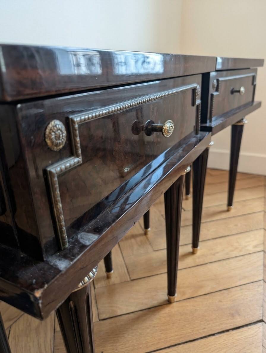 Pair of Louis XVI style bedside tables in dark wood.