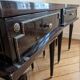 Pair of Louis XVI style bedside tables in dark wood.