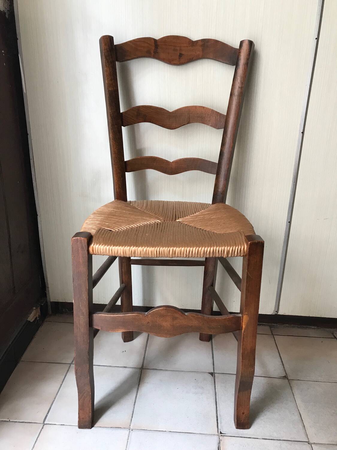 Wooden and straw chairs