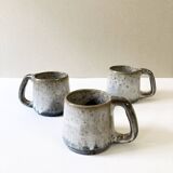 Trio of stoneware mugs