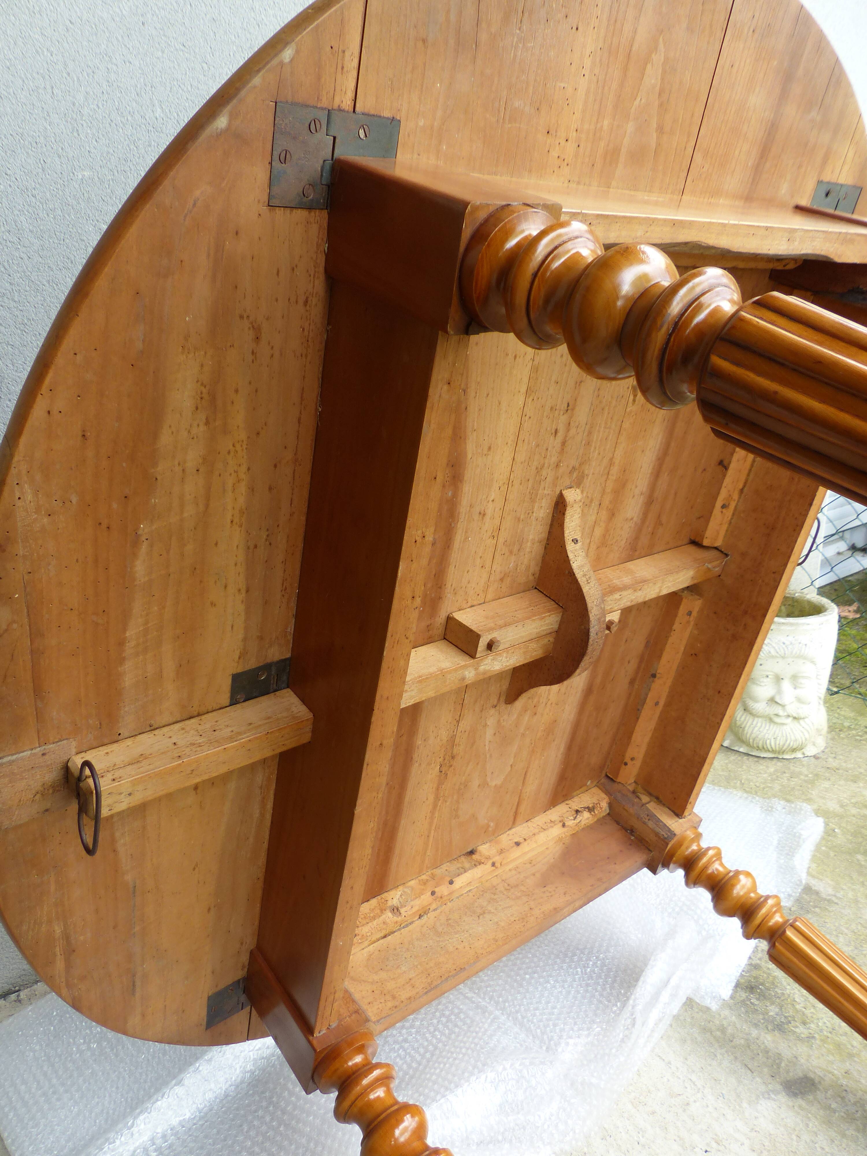 Cherry wood shuttered table.