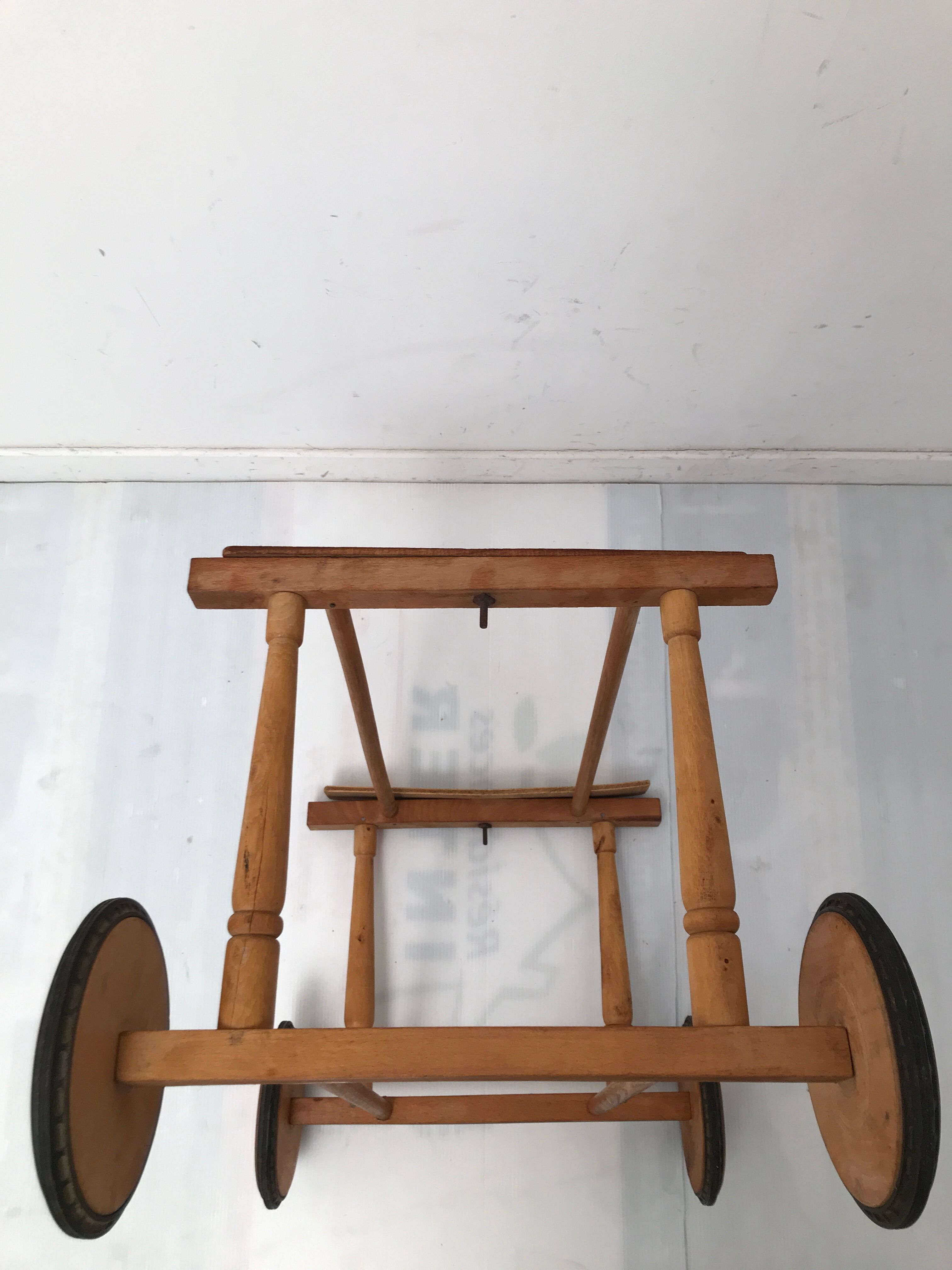Vintage wicker cradle with 50-60s wheels