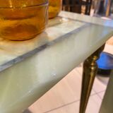 Coffee table in onyx and brass