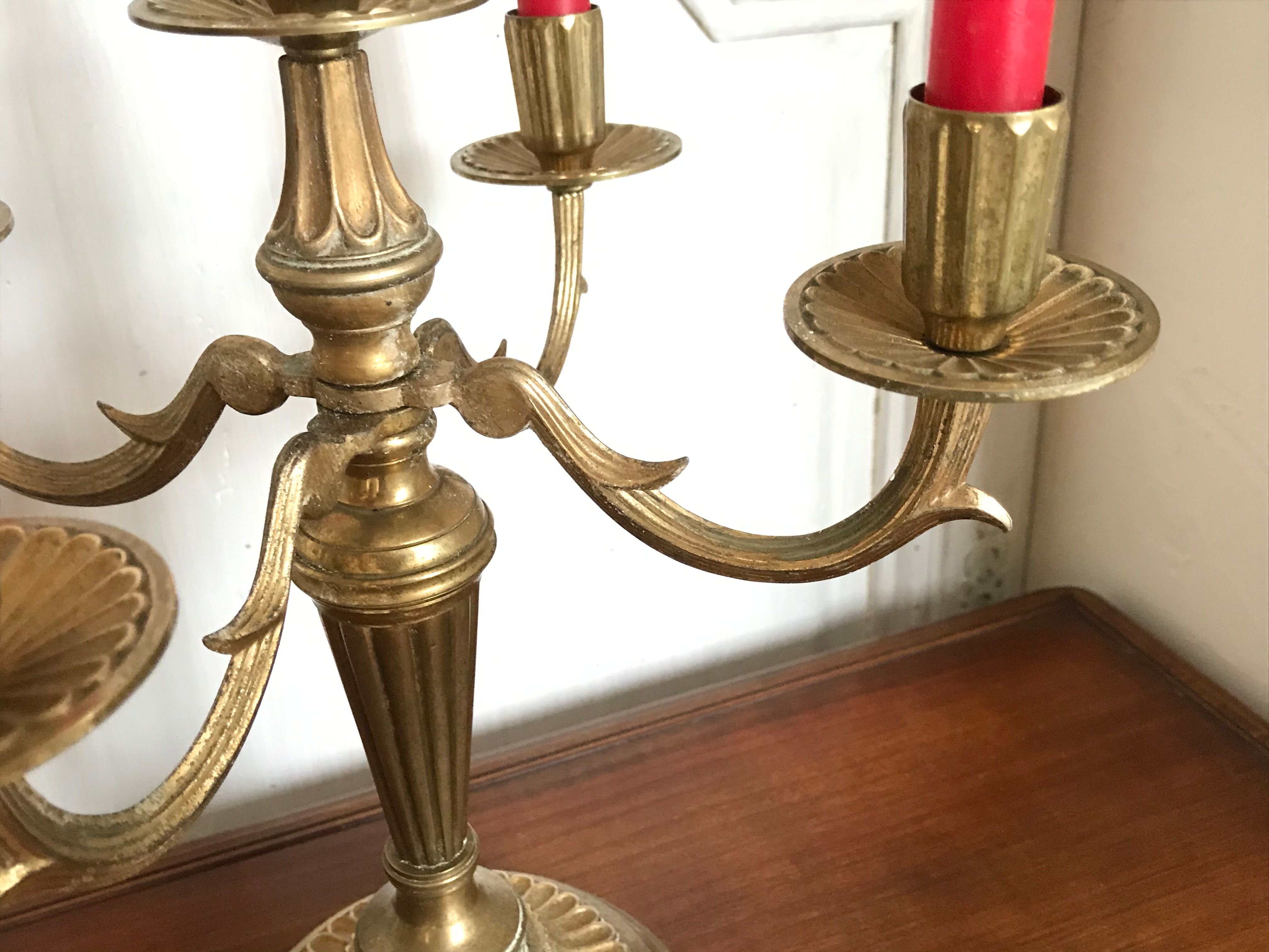 Pair of golden brass candlesticks