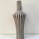 Graphic ceramic vase with black and white stripes