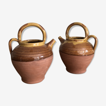 Pair of vintage terracotta watering cans