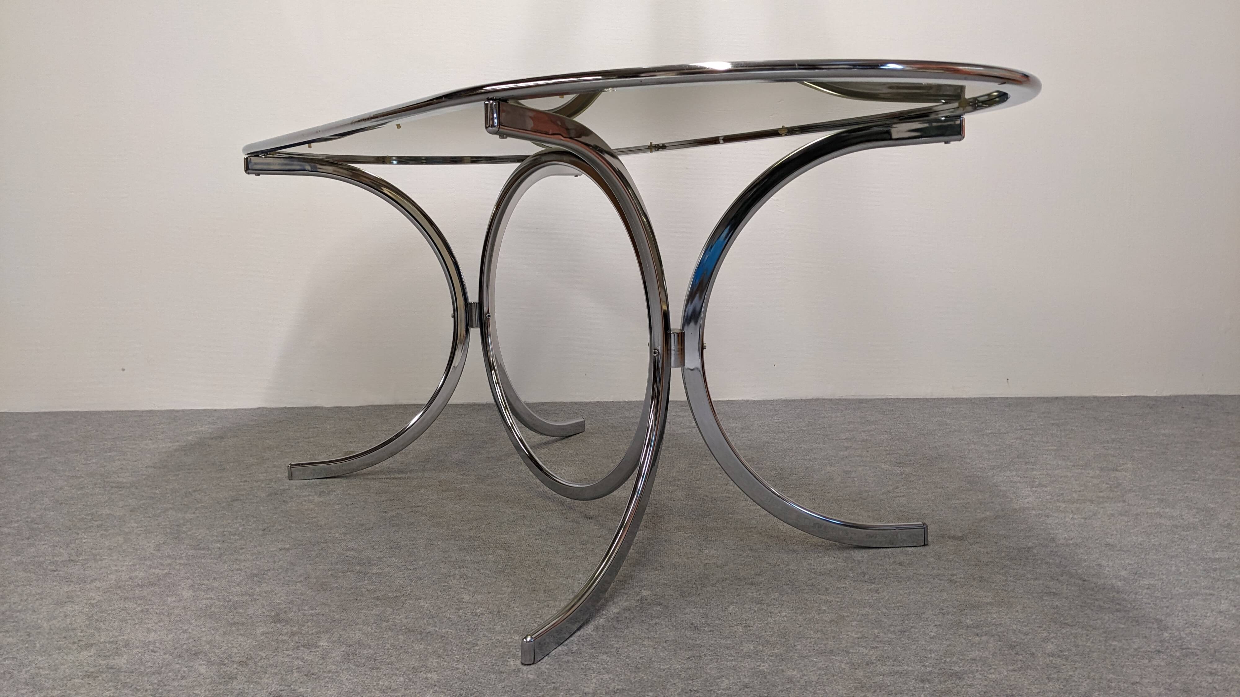 Chrome metal and smoked glass dining table, Italy circa 1970.