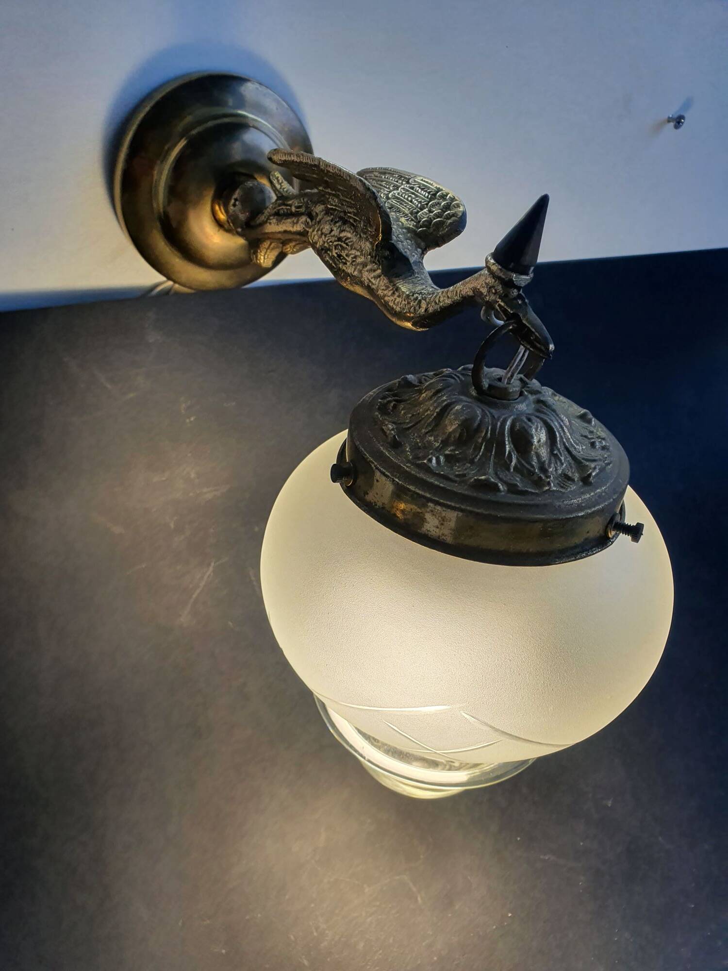 Pair of antique bronze wall sconces