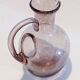 Large ice pitcher from Verrerie de Biot in amethyst bubble glass.