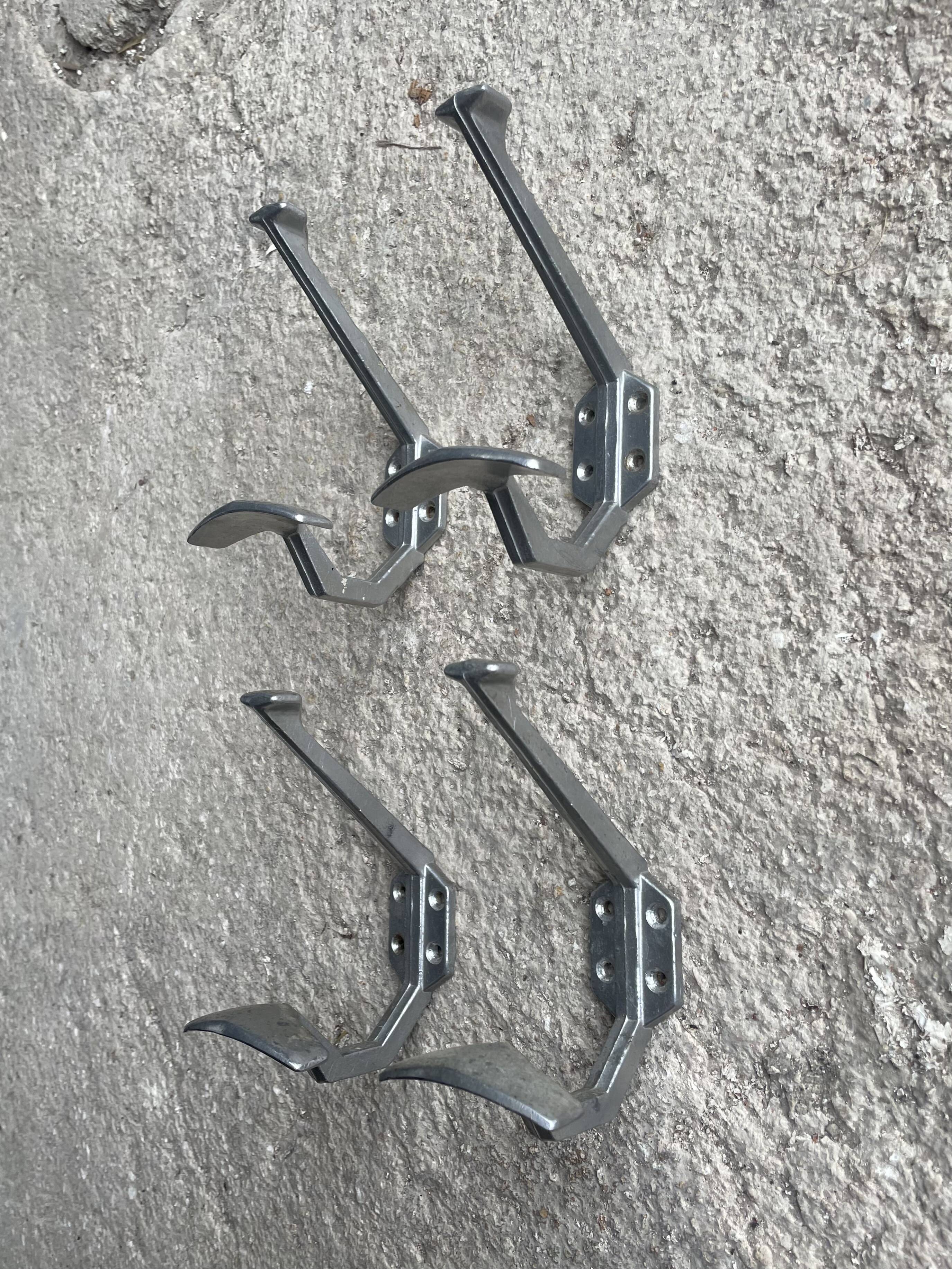 Set of 4 old metal coat hooks