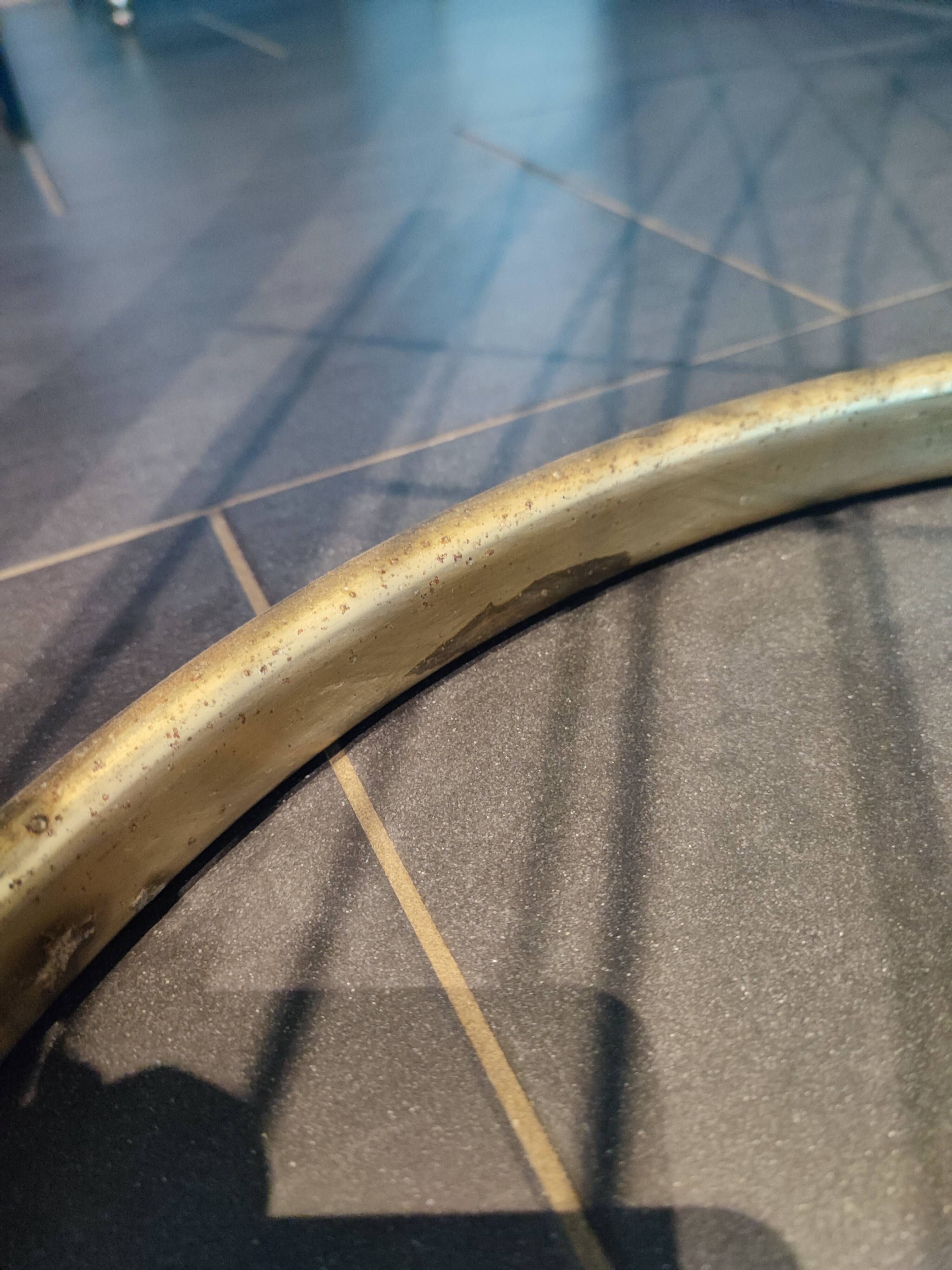 Tubular metal chair covered with gilding