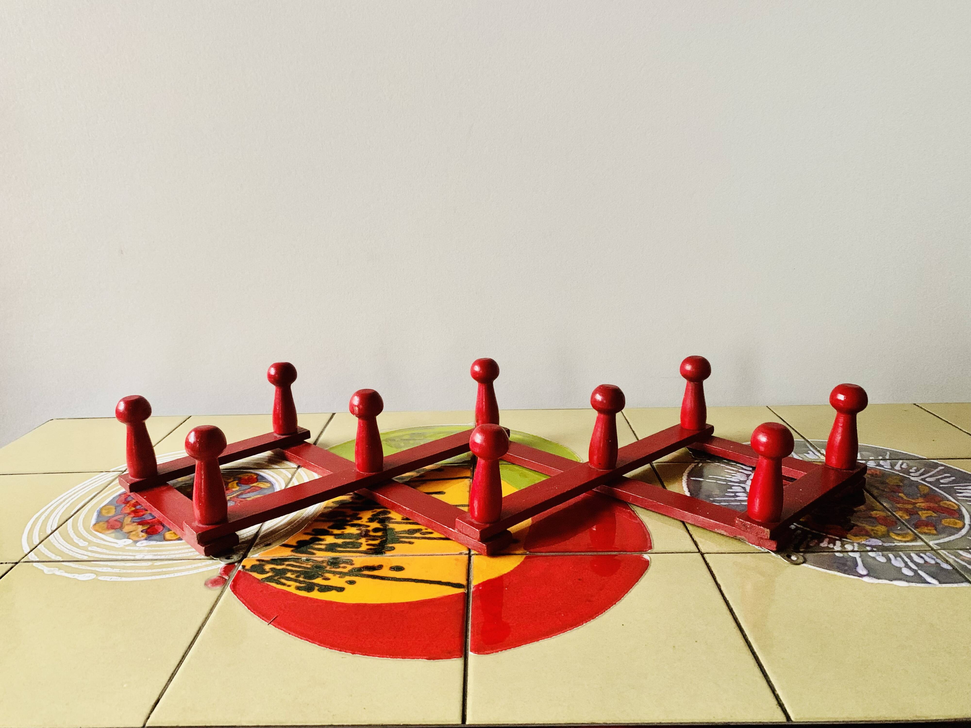 Vintage accordion coat rack in red painted wood