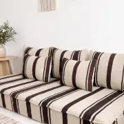 Coussin de sol en kilim rayé marron – laine tissée à la main, base crème