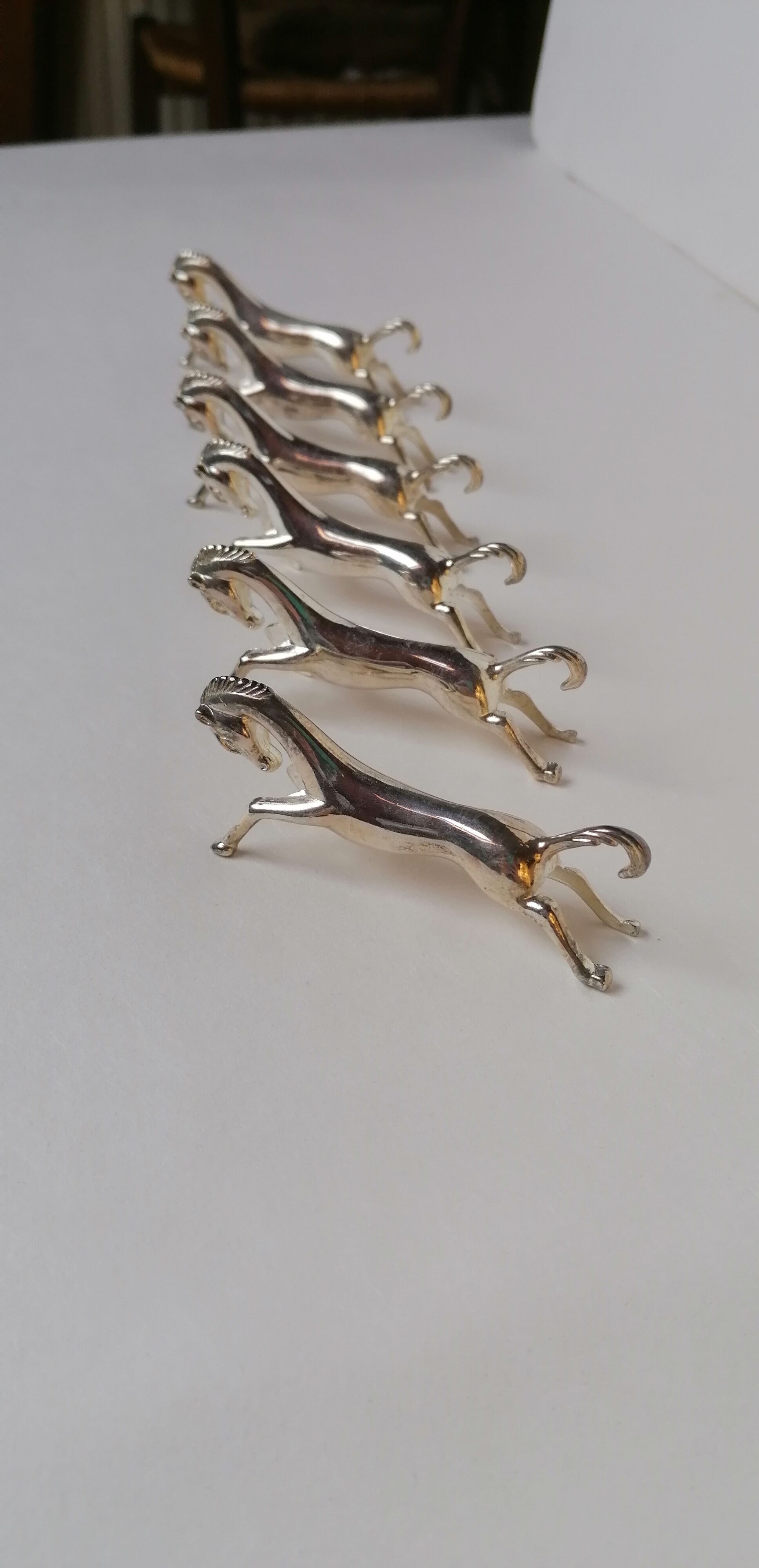 6 porte-couteaux métal argenté forme cheval