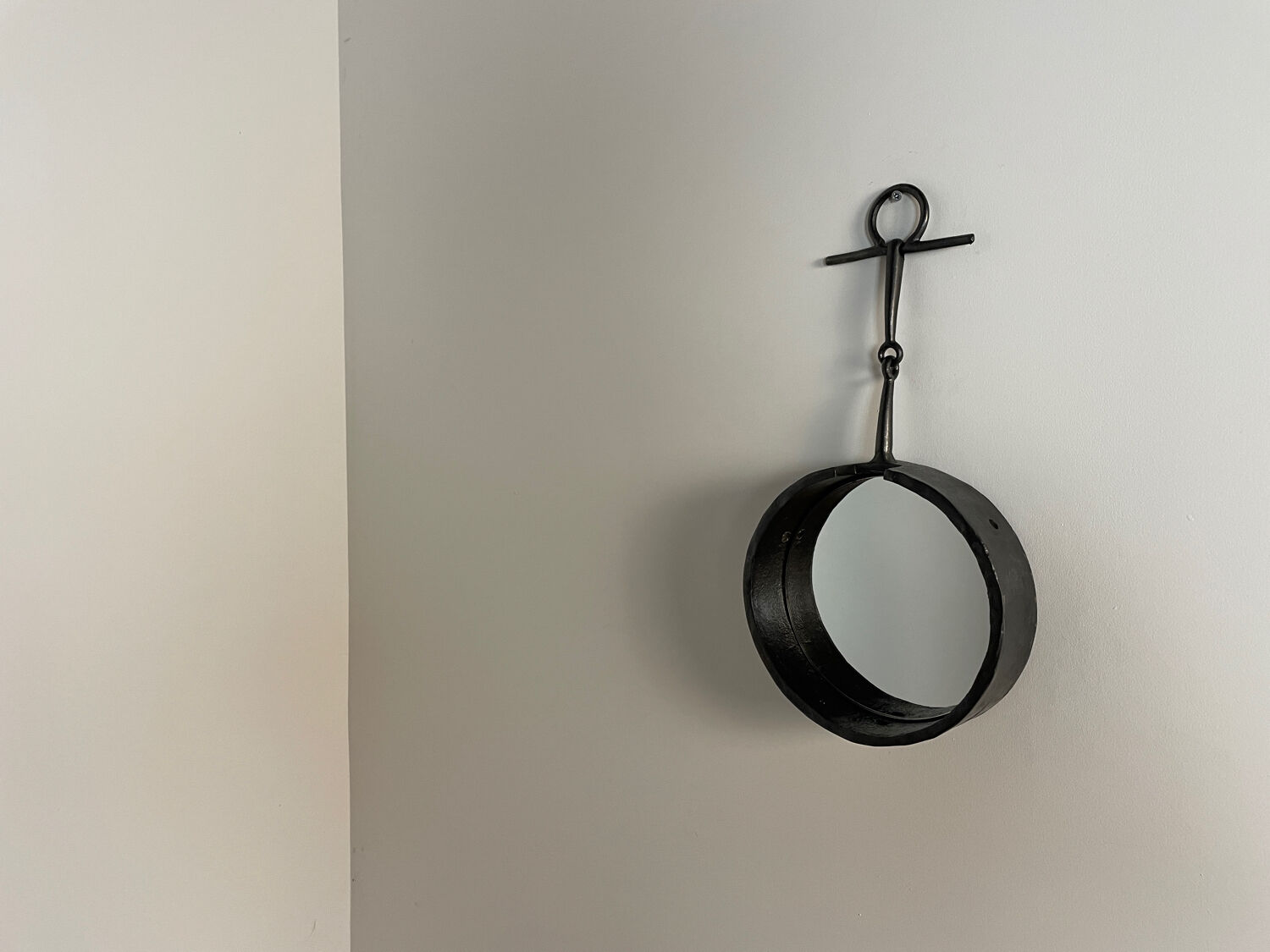 Brutalist iron mirror