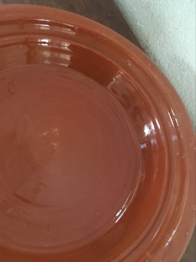 Glazed terracotta dish.