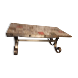 Base table in wrought iron thicken and tiled floor