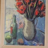 Bouquet rouge et bouteille de vin