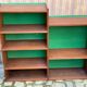 Vintage Scandinavian shelf from the 1960s in wood with green velvet.