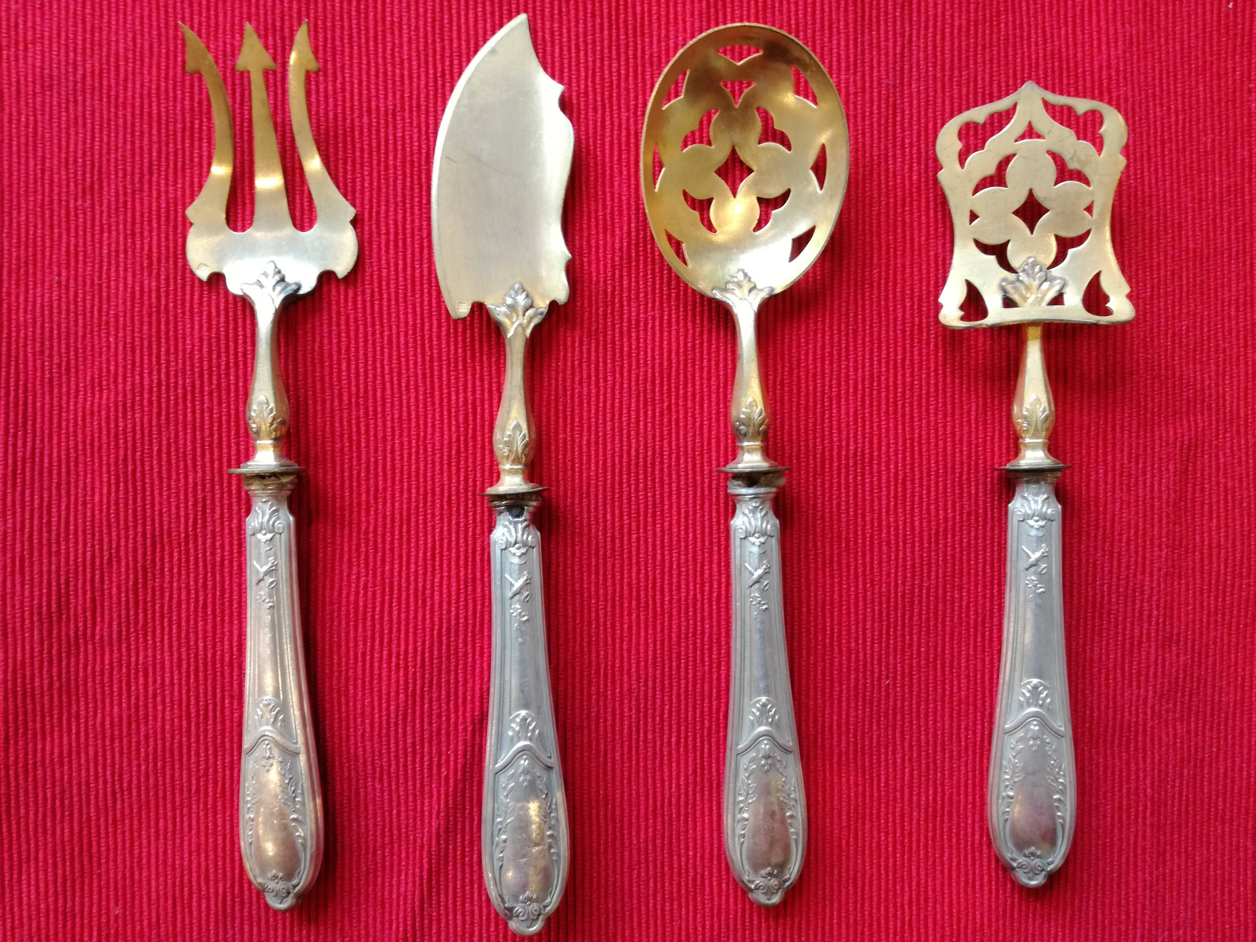 Cutlery with mignardises Late nineteenth silver and vermeil