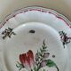Assiette ancienne Lunéville – décor floral & insecte – vers 1840–1860