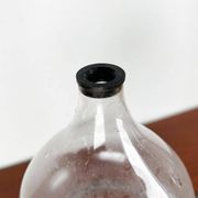 Mid-century Danish wrought iron and glass table oil lamp, 1960s.