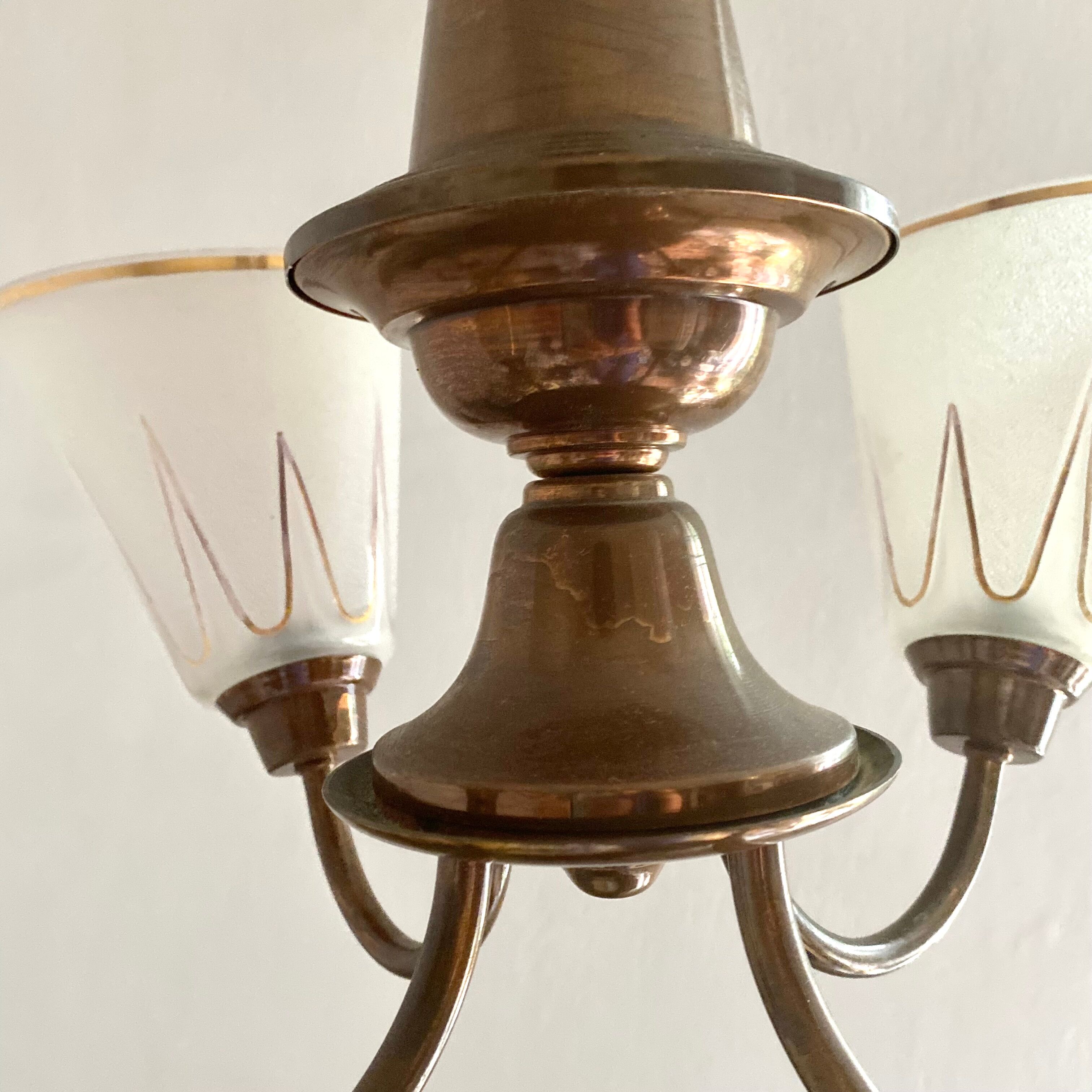 Art deco chandelier in copper and granite glass