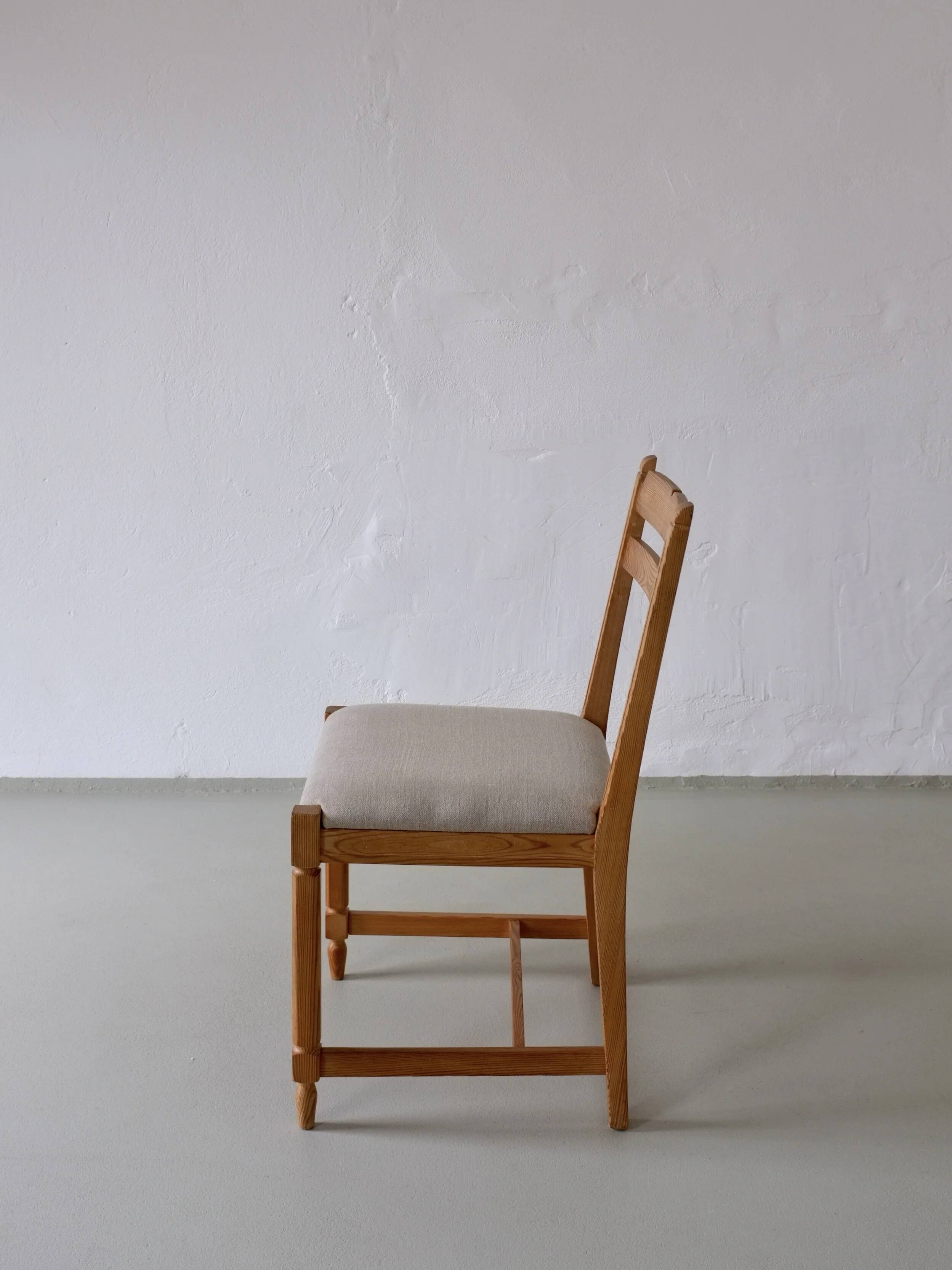 4 rustic carved pine chairs | Sweden | 1950s