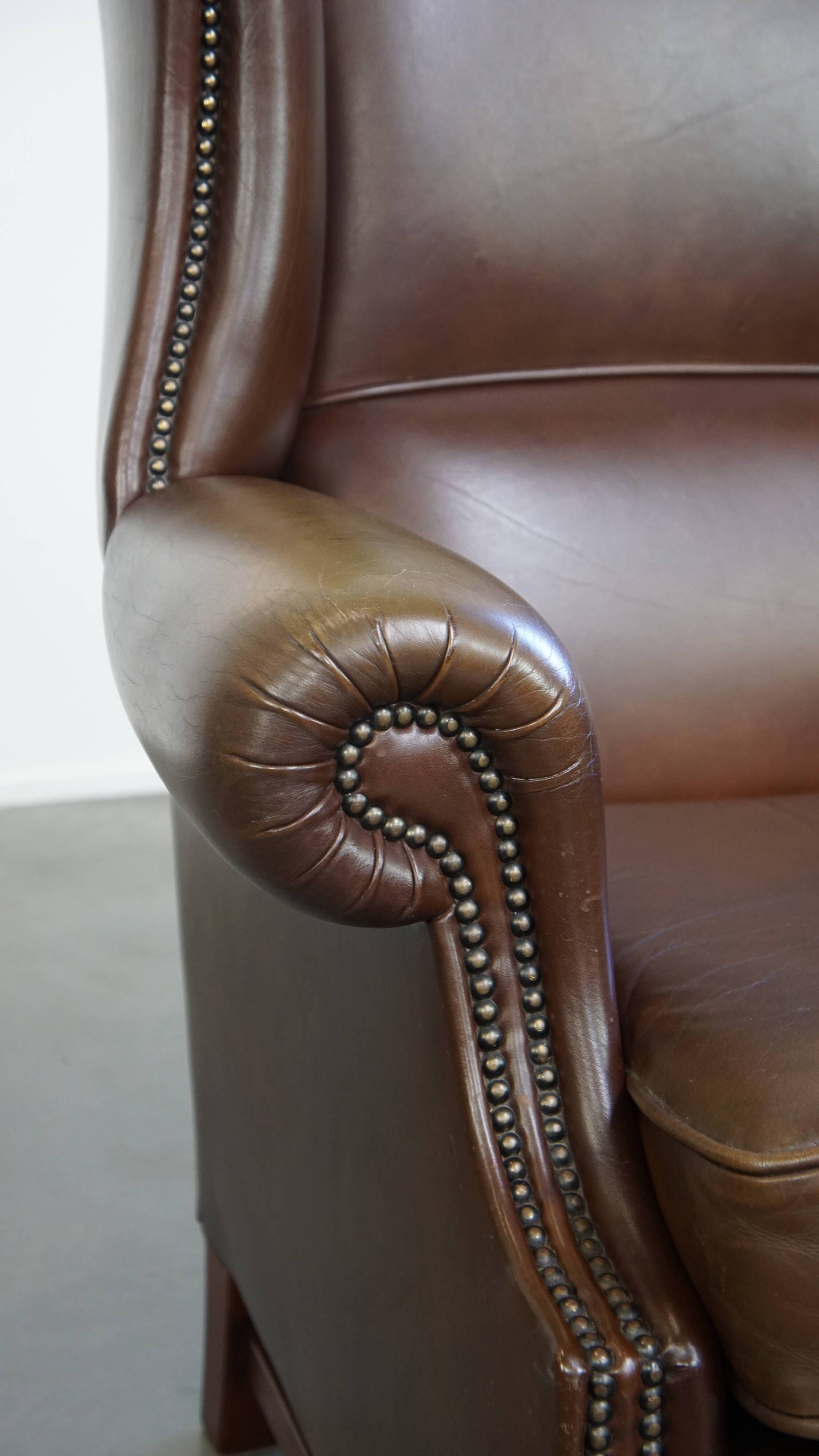 Large Dark Brown Cowhide Leather Wingback Chair