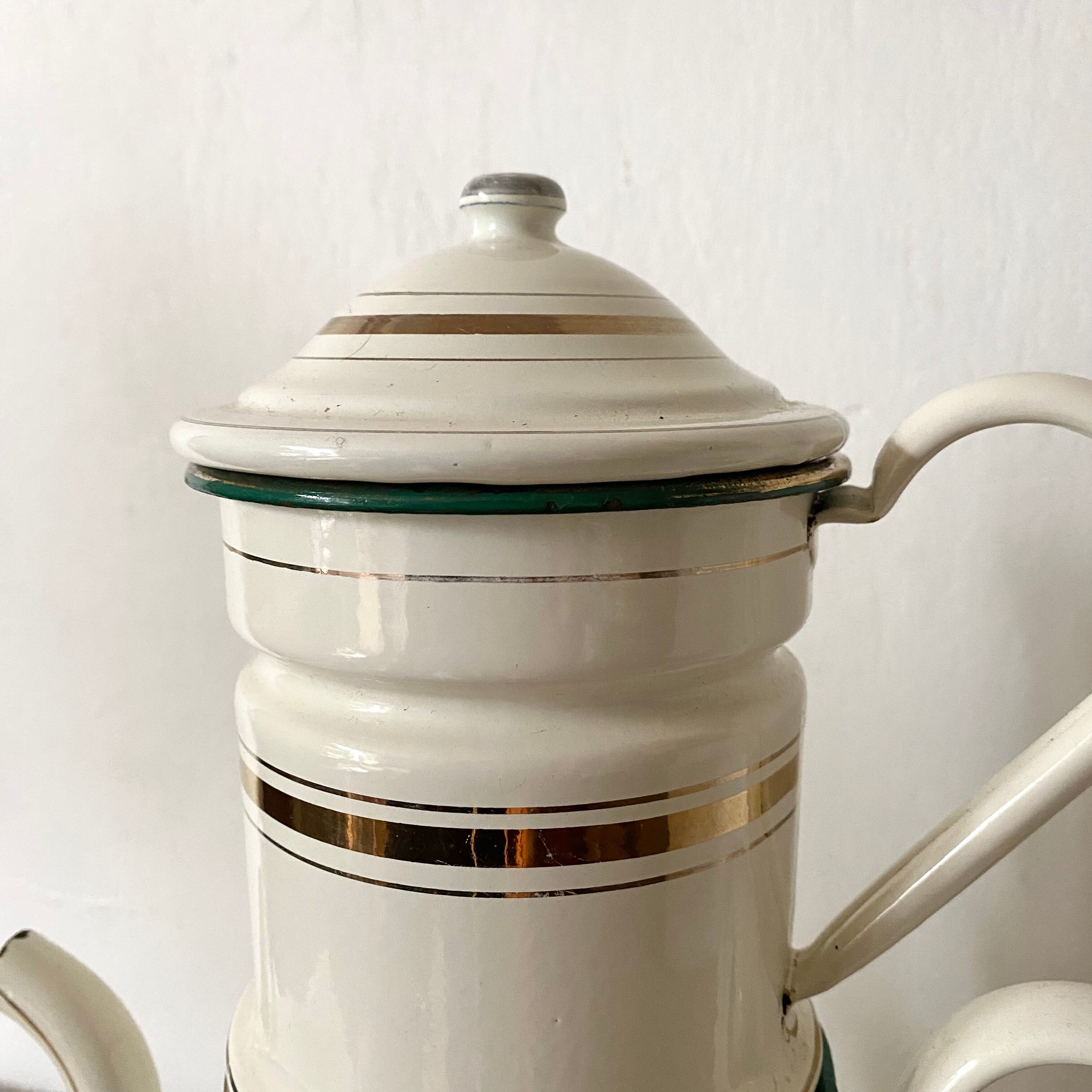 Antique coffee maker in enamelled sheet metal