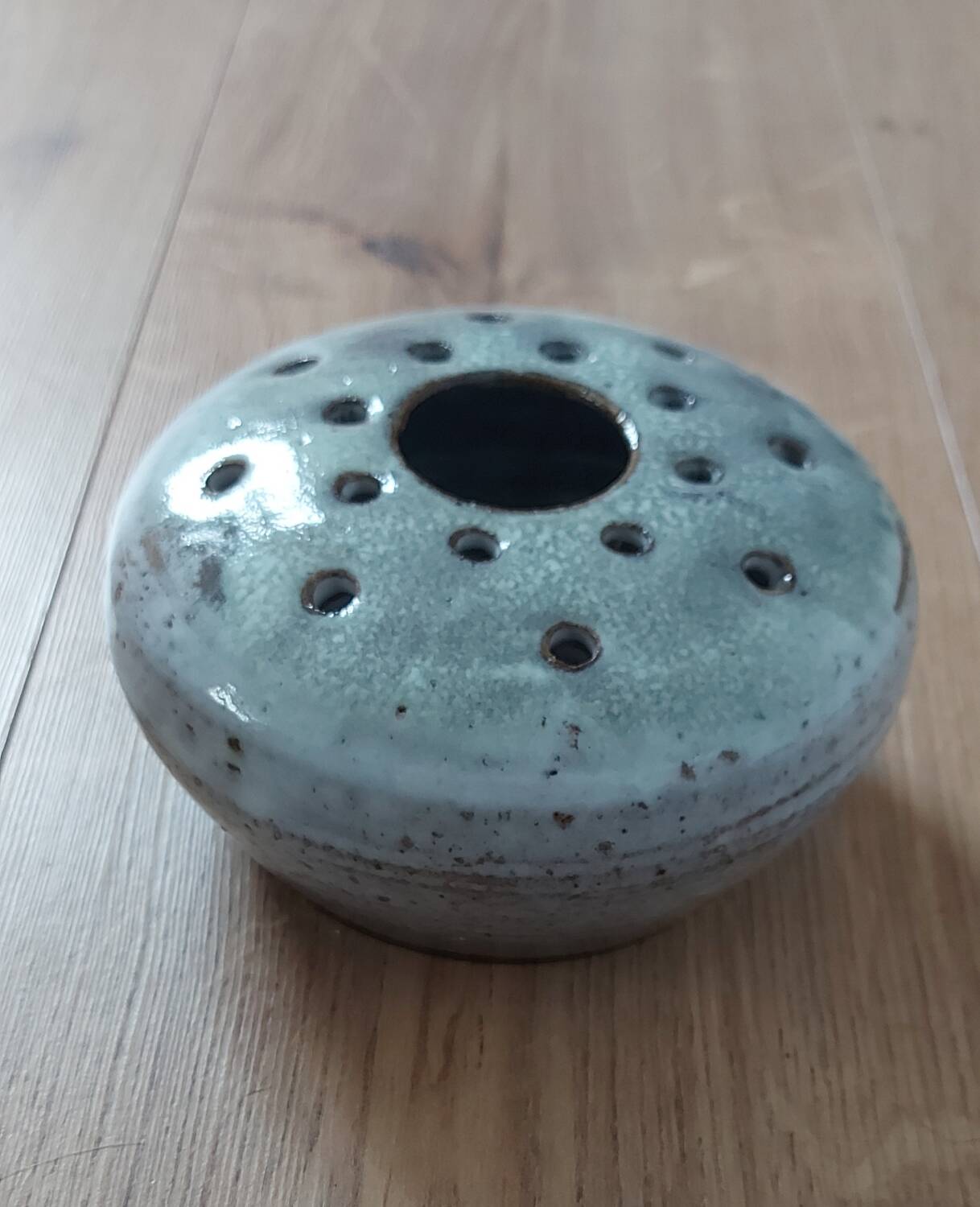 Signed ceramic flower pick