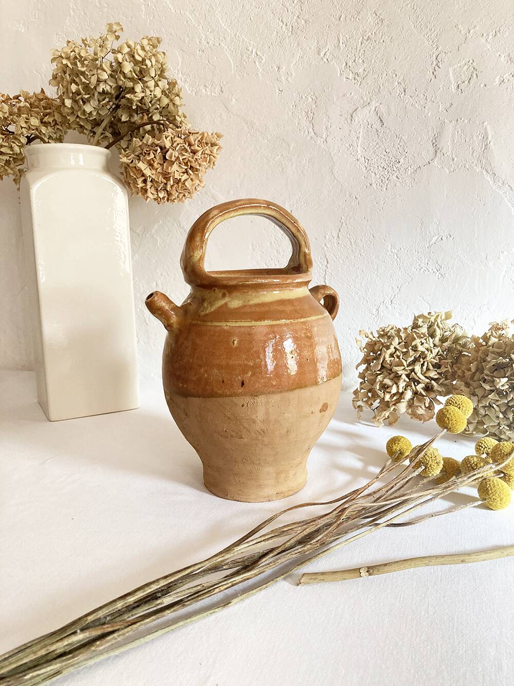Old ochre and yellow glazed ceramic jug / goat