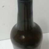 Old bottle made of blown glass