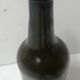 Old bottle made of blown glass