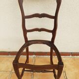 Regence chairs in straw-covered oak