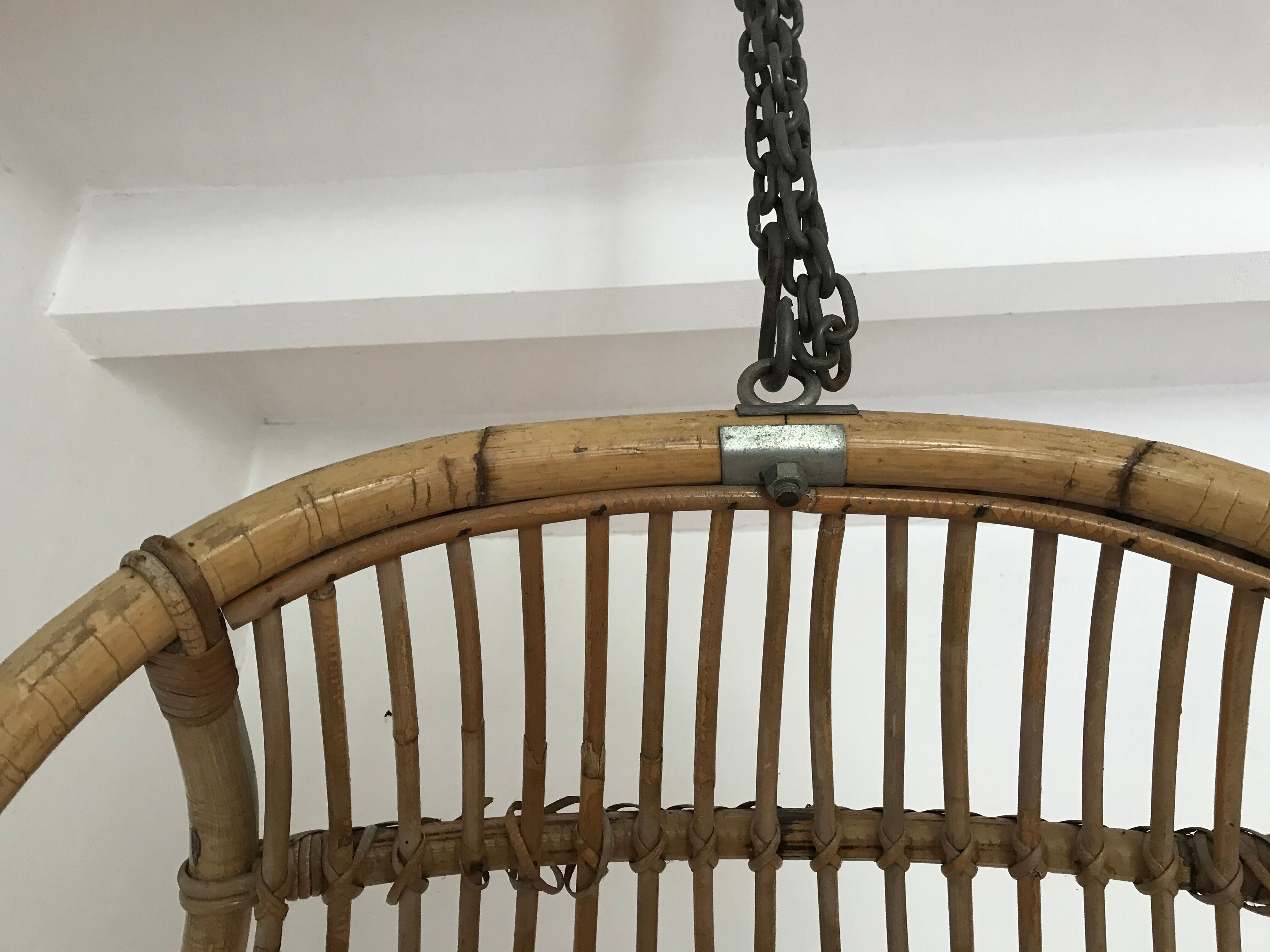 Vintage chair suspended in rattan