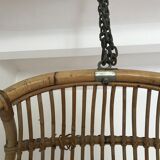 Vintage chair suspended in rattan