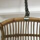Vintage chair suspended in rattan